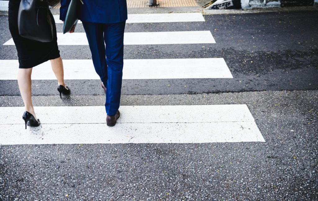 pedestrians crossing a crosswalk
